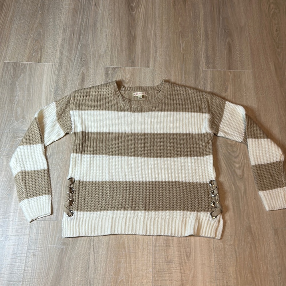 Woman’s size small tan and white sweater brand is Its our time